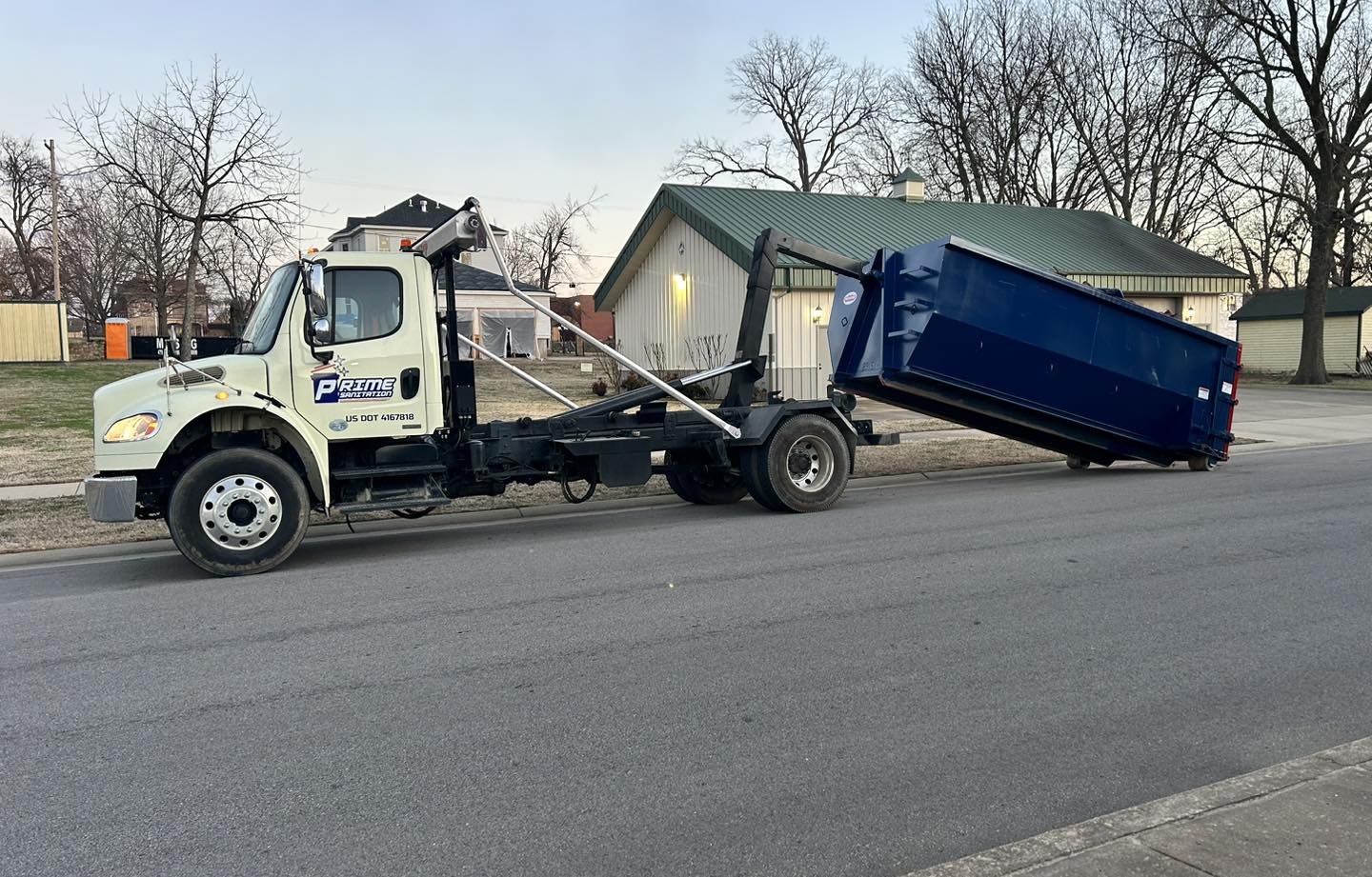 Prime Dumpster Rentals roll-off dumpster on a residential job in Fort Smith AR