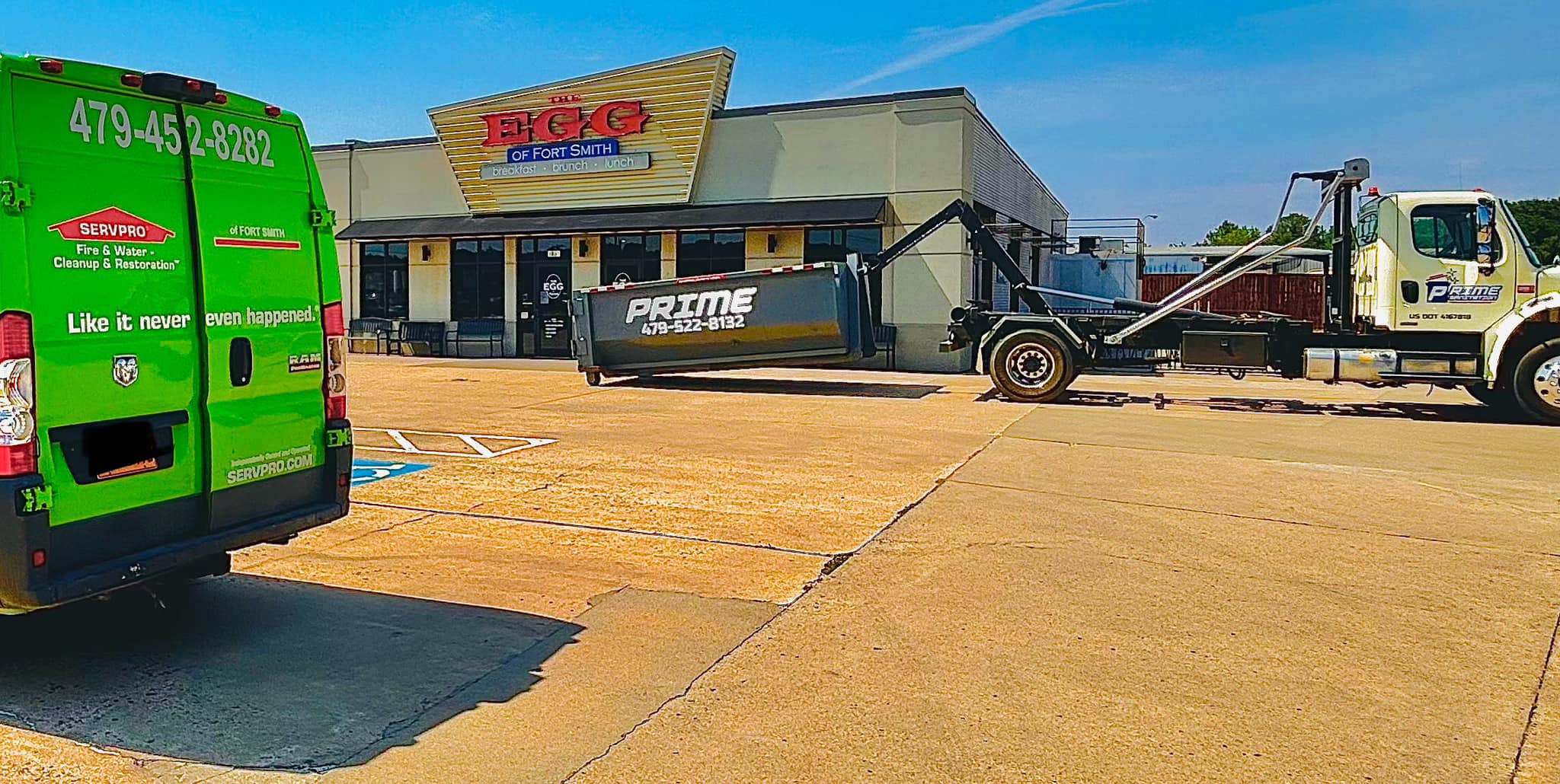 Prime Dumpster Rentals roll-off dumpster on a job site in Fort Smith AR